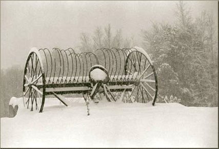 hay rake in snow